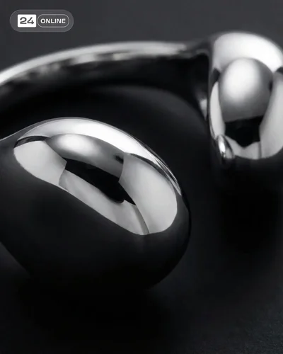 Luxury jewelry close-ups and editorial styling with soft light and refined textures