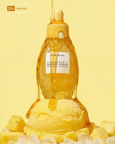 Luxury desert editorial perfume photography with faceted glass bottle and warm cinematic fashion styling