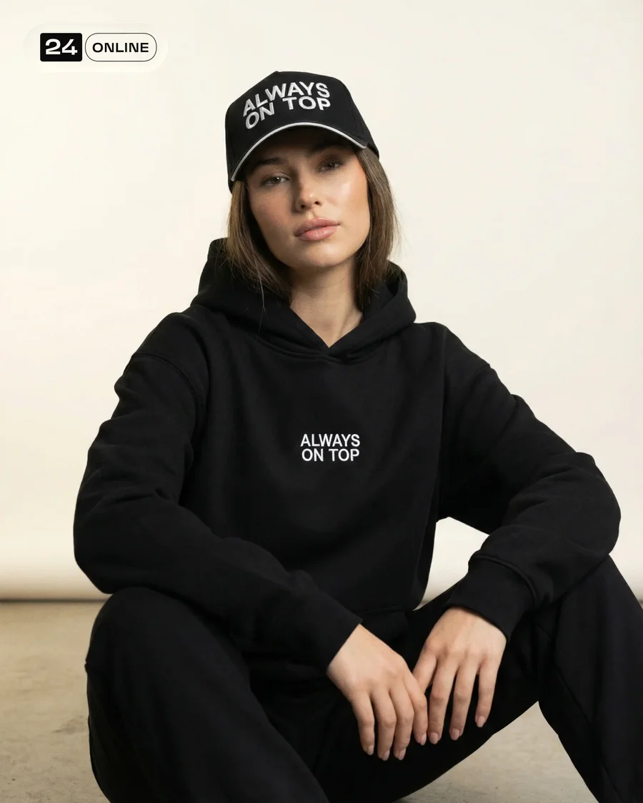 Luxury editorial scarlet baseball cap and matching hoodie in clean high-fashion… — AI-generated example 6 of 6