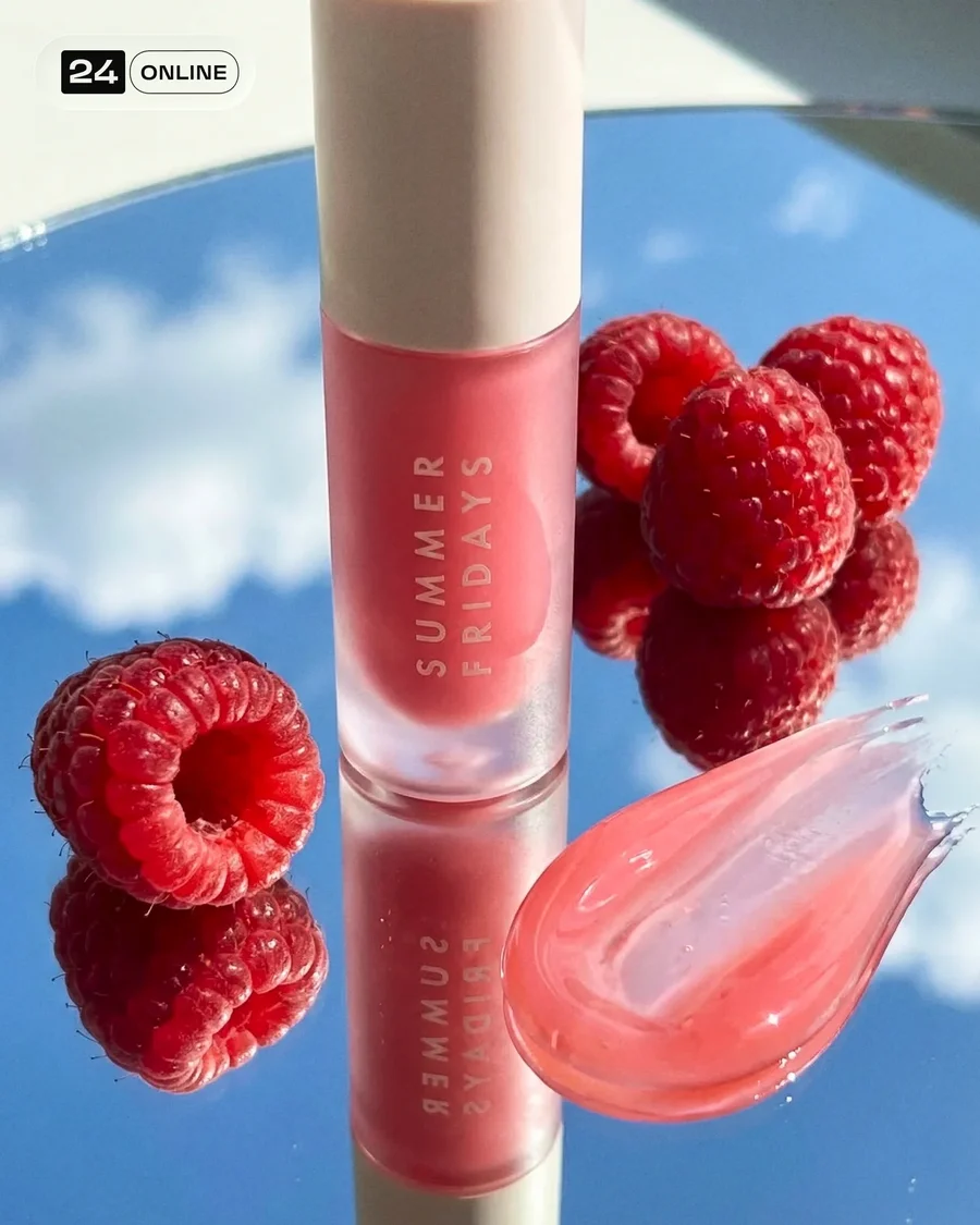 Hyper-real beauty lip gloss campaign with dewy skin, raspberries, and bright… — AI-generated example 3 of 5