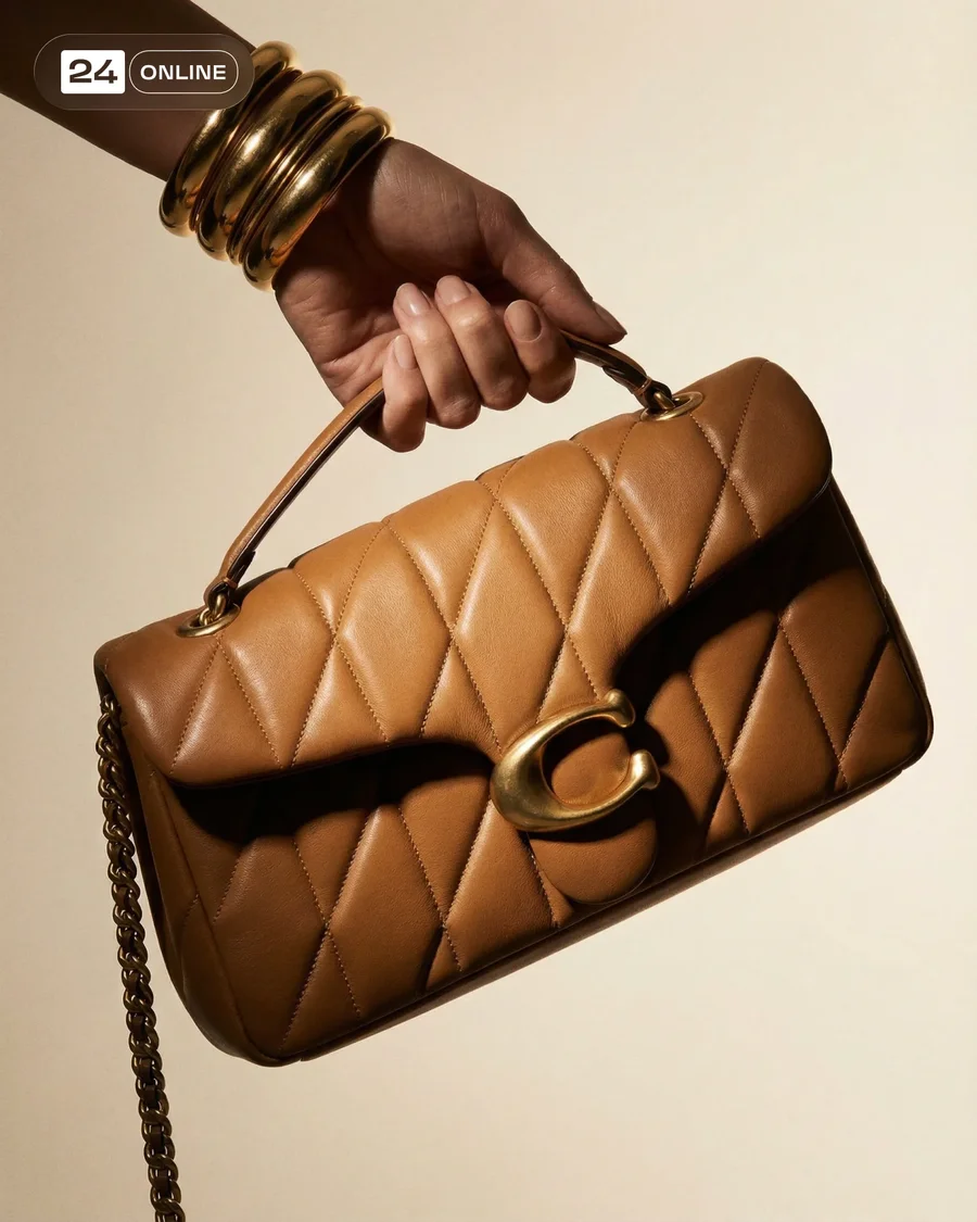 Luxury editorial handbag photography with quilted leather, gold hardware, and… — AI-generated example 2 of 5