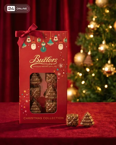 Luxury Christmas cosmetic packaging photography with velvet, festive props, and warm editorial lighting