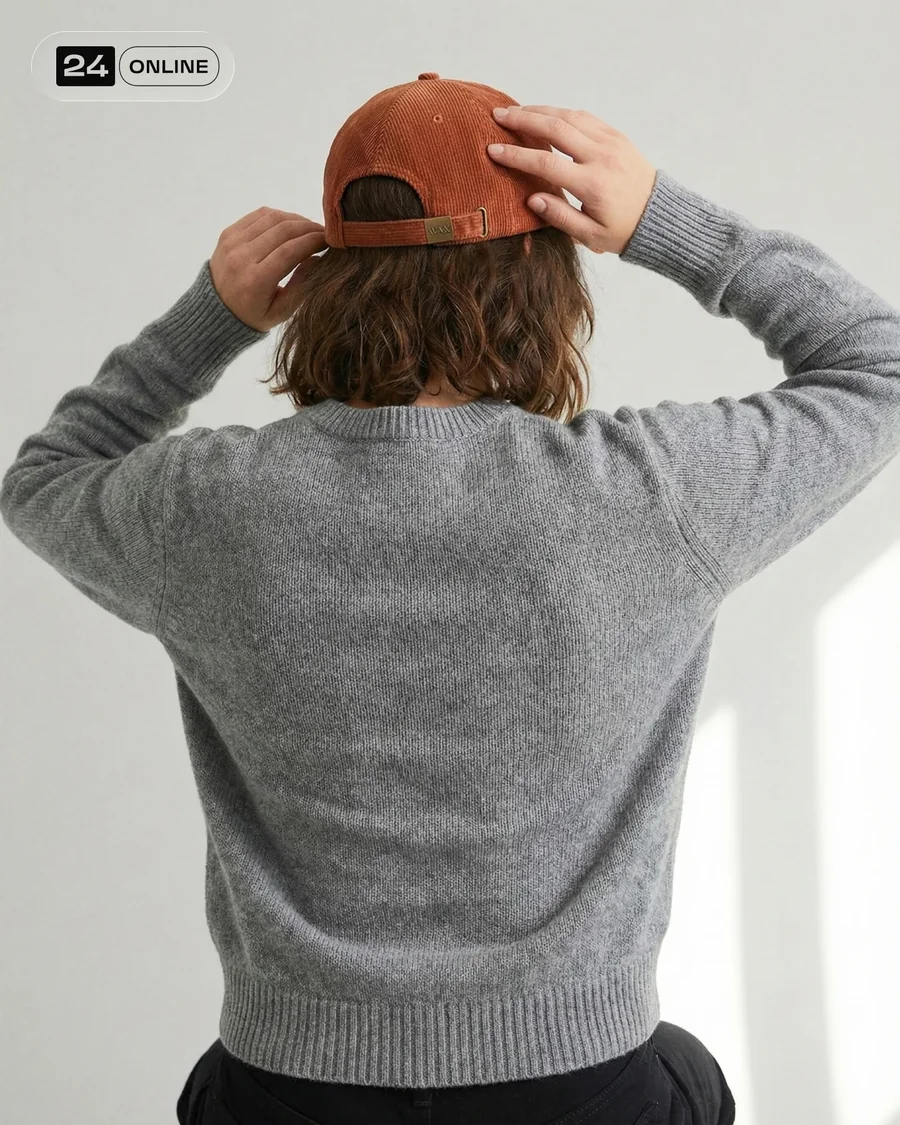 Minimal editorial studio photos of a casual embroidered cap on model and… — AI-generated example 3 of 5