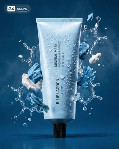 Premium chilled beverage product with dynamic water splashes on deep blue background