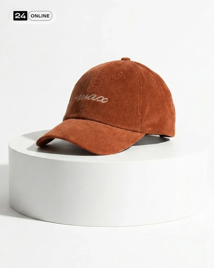 Minimal editorial studio photos of a casual embroidered cap on model and… — AI-generated example 5 of 5