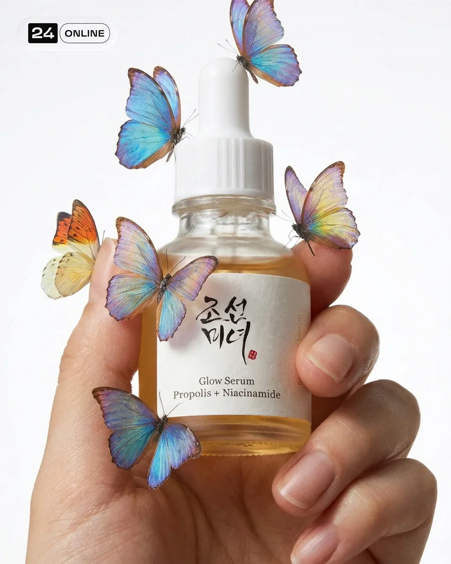 Luxury serum bottle in hand with insects or snails, clean white studio style — AI-generated example 2 of 4