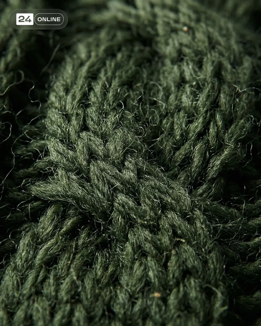 Luxury knitwear close-ups with hyper-realistic textile texture, stitches, and… — AI-generated example 3 of 4