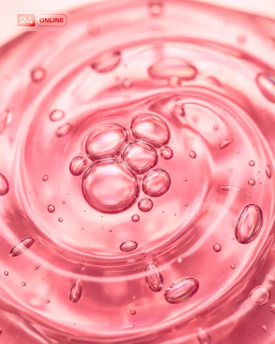 Glossy pink skincare gels with watermelon accents in fresh macro beauty… — AI-generated example 5 of 5