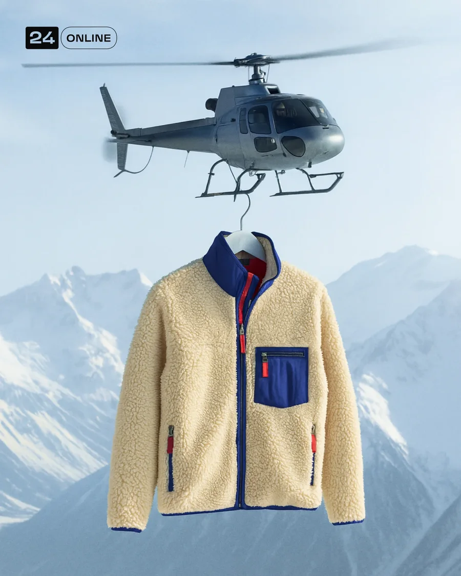 Luxury product suspended beneath helicopter over snowy mountains in cinematic… — AI-generated example 2 of 3